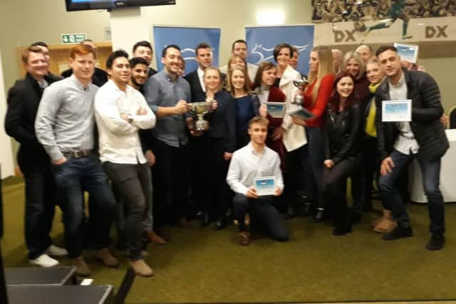 A group of 25 Melton Mowbray TC players attended the awards night, here posing with GBs David Cup captain Leon Smith EMN-180703-091204002