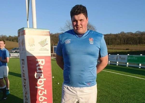 Melton RFC Colt Isaac proudly wears the Red Rose of England EMN-180703-101221002