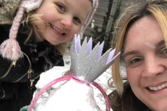 Mrs Copeland (teacher at Redmile) with daughter Ruby and their snow penguin from 'Tacky and the Emperor' by Helen Lester PHOTO: Supplied