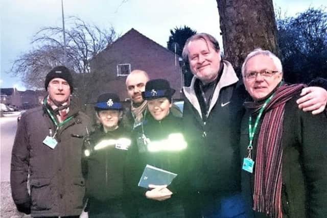 Police officers take part in a Patch Walk around Melton with members of Melton Matters and borough councillor Alan Pearson EMN-180313-121442001