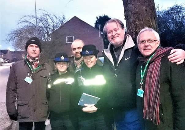 Police officers take part in a Patch Walk around Melton with members of Melton Matters and borough councillor Alan Pearson EMN-180313-121442001
