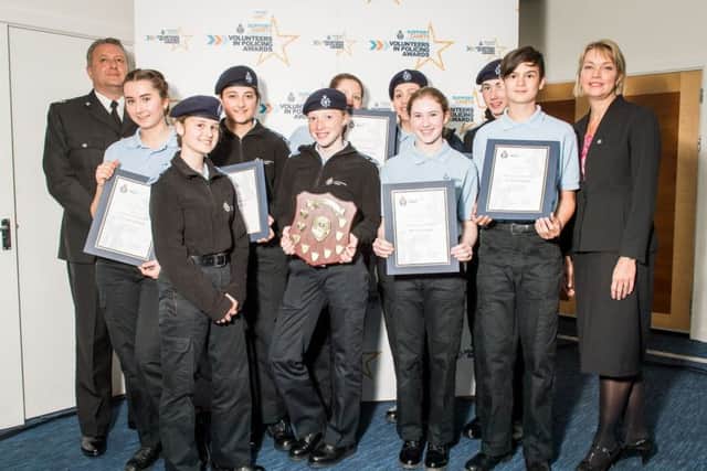 Members of the Melton Police Cadet unit receive the award for Volunteer Police Cadet Unit of the Year at the annual Volunteers in Policing Awards EMN-180314-151407001