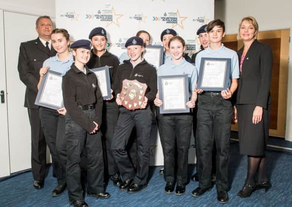 Members of the Melton Police Cadet unit receive the award for Volunteer Police Cadet Unit of the Year at the annual Volunteers in Policing Awards EMN-180314-151407001