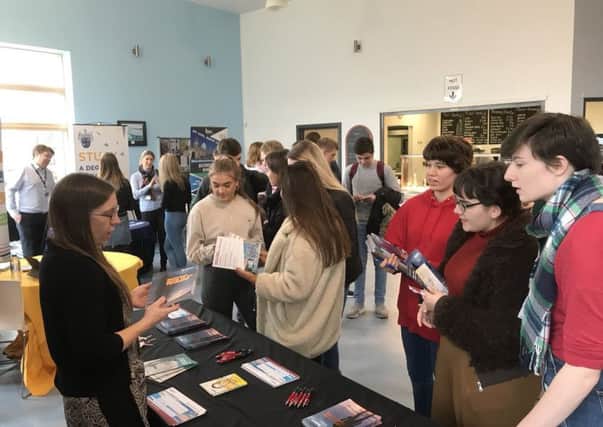 Student find out about university course information at the Post 18 Progression Fair PHOTO: Supplied