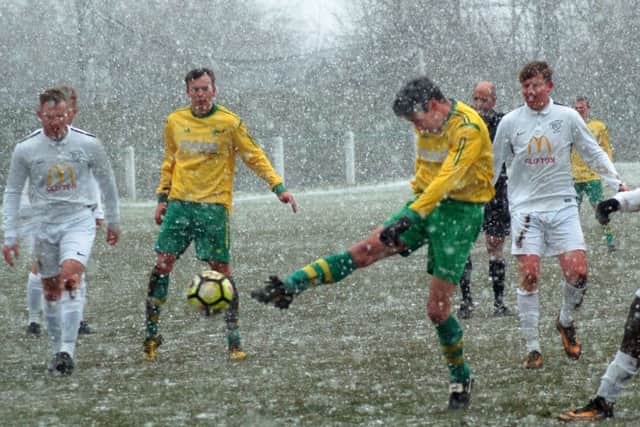 Holwell dominated the first 65 minutes as the snow came down at Welby Road EMN-180319-113411002