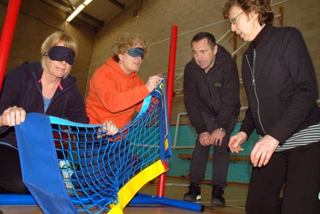 Danny Sapsford oversees a visually impaired coaching exercise. EMN-180320-143803002