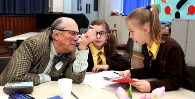 Mr Christopher Wren with pupils Maisie and Kylie PHOTO: Rafal Orzech