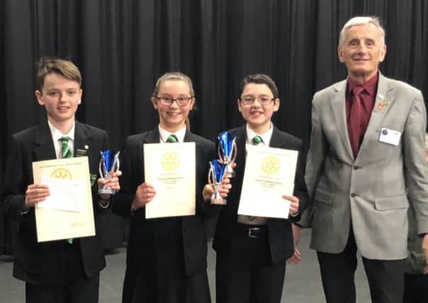 Intermediate team - Tom McEnery, Cecilly Parsons and Daniel Williams pictured with past district governor John Dehnel PHOTO: Supplied