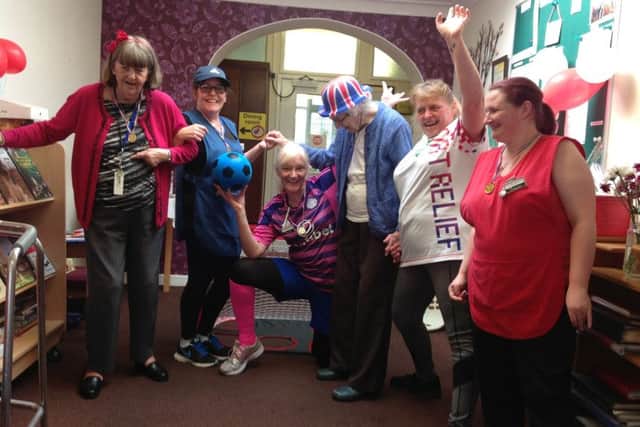 Staff and residents at Hunters Lodge enter into the spirit of Sport Relief with a kick about PHOTO: Supplied