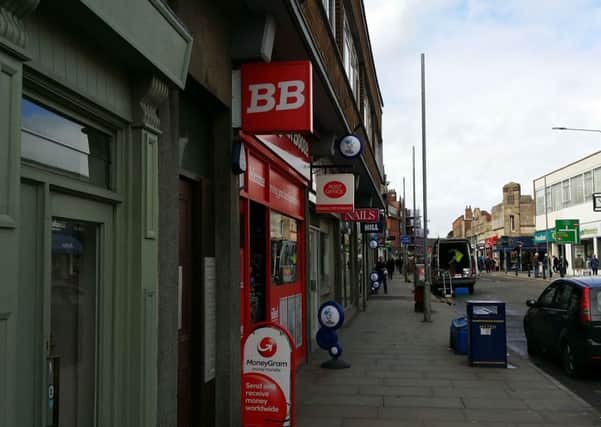 The Bargain Booze store in Melton which also houses the town's Post Office EMN-180404-133751001