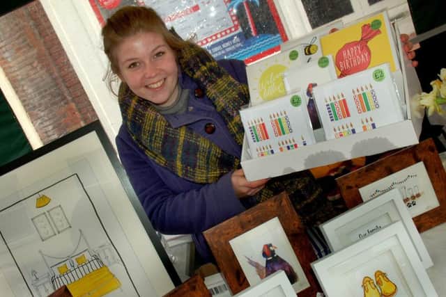 Becca Simmons with some of her Beccas Design illustrations PHOTO: Tim Williams