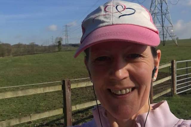 Jane Brown on a power walk listening to her music PHOTO: Supplied