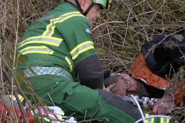 Professional investigator Darryl Cunnington being treated by a medic after being assaulted by two members of the Belvoir Hunt EMN-181004-145240001