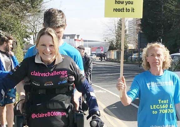Claire Lomas takes part in the ASICS Manchester Marathon EMN-181004-180731001