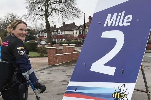 Claire Lomas takes part in the ASICS Manchester Marathon EMN-181004-180742001