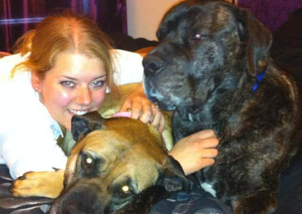 Michelle with both her pet rescue dogs PHOTO: Supplied