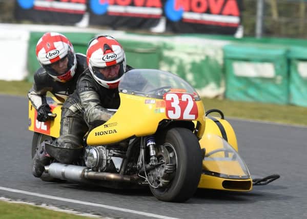 Kerry drives the sidecar with wife Jen the passenger EMN-181204-143235002