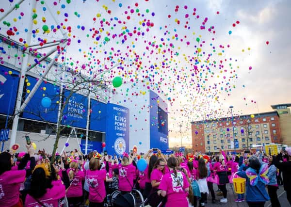 Balloons are released poignantly to remember loved ones before Saturday's LOROS Twilight Walk 10k EMN-180417-162024001