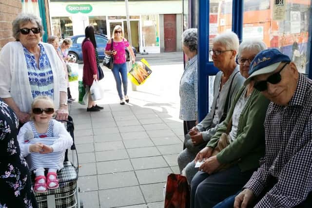 Passengers waiting for the Centrebus 14 service, in Windsor Street, Melton, which is due to be axed from June, including Brian Ellingworth (right) and Wendy Carter (with push chair) EMN-180420-121926001