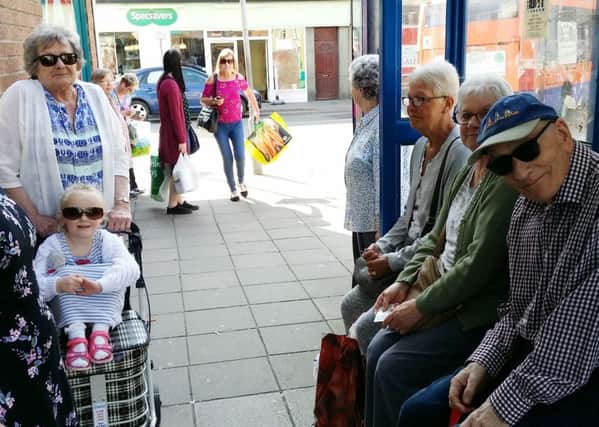 Passengers waiting for the Centrebus 14 service, in Windsor Street, Melton, which is due to be axed from June, including Brian Ellingworth (right) and Wendy Carter (with push chair) EMN-180420-121926001