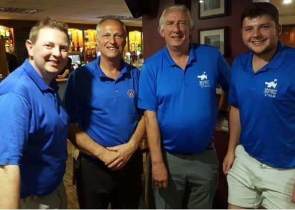 Melton Golf Club B team Steve Wright (second from left) with opposite number at Whetstone Kevin Parker (second right) EMN-180424-193019002