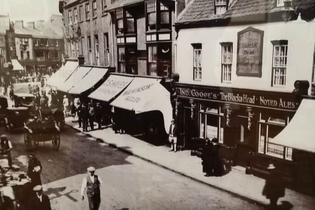 The oId Blacks Head pub in Market Place, Melton, pictured in the 1920s EMN-180424-170739001