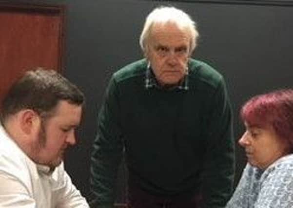 Russell Webster (Toni), Paul Puttnam (Host 1) and Gillian Bowler (Mother) in rehearsal PHOTO: Supplied