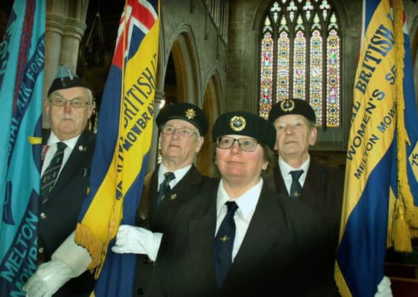 Standard bearers Phil Taylor, Chris Talbot and Eileen Booker with escort Dawn Booker at a 'laying up' service for Melton's Royal British Legion women's section, known as Keswick House Ladies' Club EMN-180430-124856001