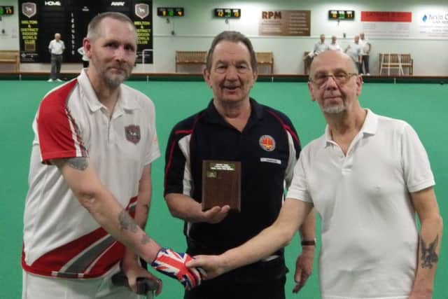 mens novice singles champion Barry Pelos (right) with runner-up Colin Wagstaff and outgoing club president Paul Noone EMN-180430-181517002