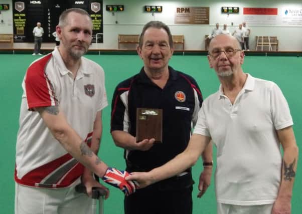 mens novice singles champion Barry Pelos (right) with runner-up Colin Wagstaff and outgoing club president Paul Noone EMN-180430-181517002