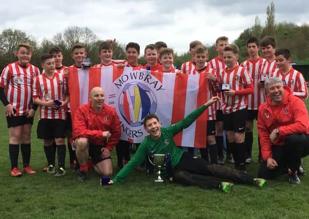 The Tigers are all smiles after getting their hands on the Chairman's Cup EMN-180105-144454002