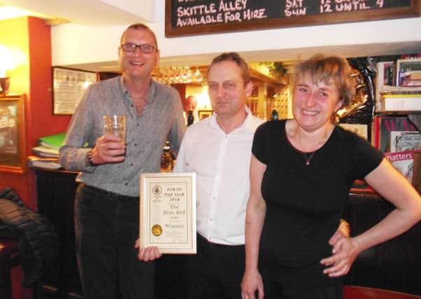 Melton CAMRA chairman Kevin Billson with landlords Mike Lynn and Clare Highton at the Blue Bell, Hoby, which has been named CAMRA Melton Area Pub Of The Year 2018