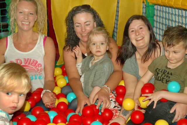 Amy Bayes and daughter Lily-bow (centre) have fun with friends in the ball pit at the Kingdom 4.5 Soft Play centre, at Melton, which has been provided in memory of Amy's son, Luke EMN-180905-091605001