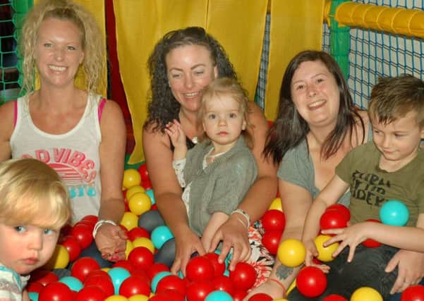 Amy Bayes and daughter Lily-bow (centre) have fun with friends in the ball pit at the Kingdom 4.5 Soft Play centre, at Melton, which has been provided in memory of Amy's son, Luke EMN-180905-091605001