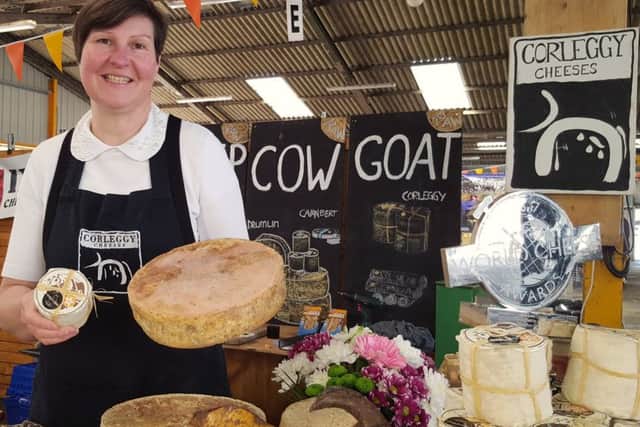 Karen Janowitz shows off some of her Corleggy cheeses from Ireland PHOTO: Tim Williams