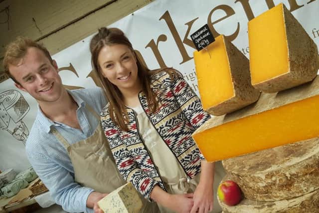 Will Clarke and India Bosden with their Sparkenhoe cheeses from the Leicestershire Handmade Cheese Company PHOTO: Tim Williams