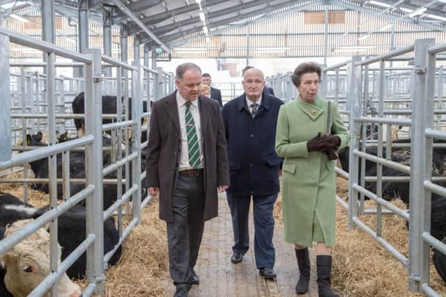 Princess Anne takes a stroll through the new cattle sheds as she officially opens new developments at Melton Cattle Market
PHOTO Paul Brown Imaging Ltd EMN-181203-125946001