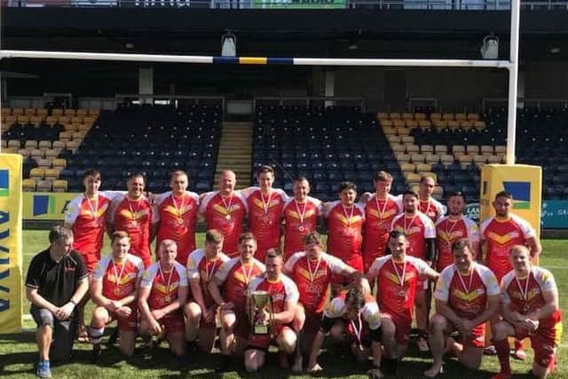Melton RFC player James Marman and his team-mates who helped break the world record for the longest continuous rugby match and raised £5,000 for the Fire Fighters Charity EMN-180805-161533001
