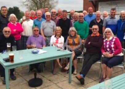 Teams enjoy a post-match drink at the fundraising match EMN-180805-181157002
