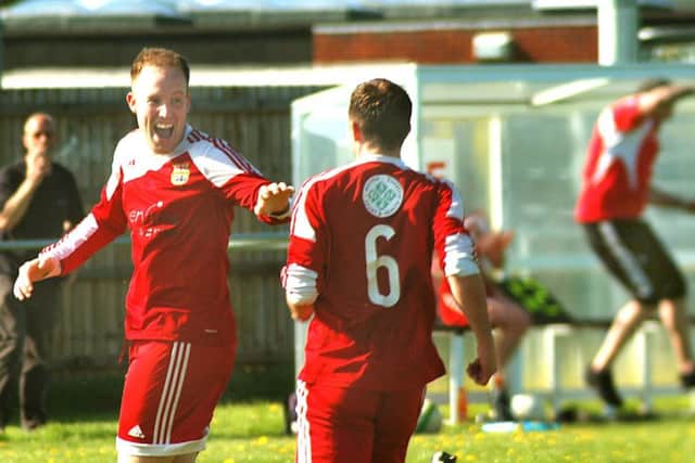 Ben Lapworth celebrates putting Melton ahead for the second time against Rushden EMN-180905-122933002