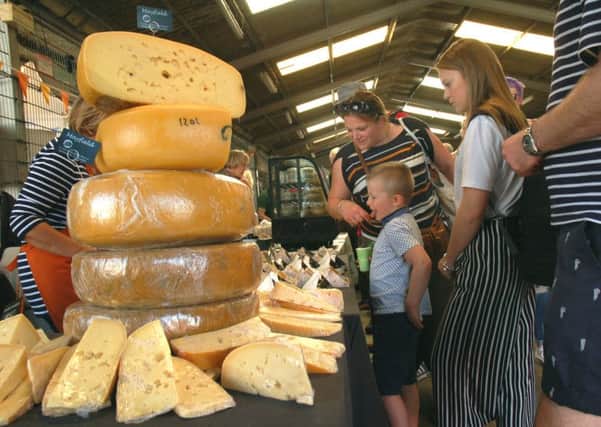 Cheese on display in all shapes and sizes at the Artisan Cheese Fair in Melton PHOTO: Tim Williams EMN-180905-135525001