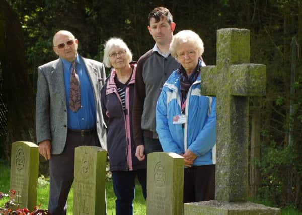 Melton in Bloom representatives Brian Hodder, Maureen Betts and Lucy Wood, with borough councillor Simon Lumley in the cemetery where they are campaigning to get graves of former servicemen cleaned up EMN-180905-150135001