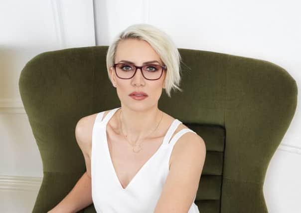 Steps superstar Claire Richards is encouraging spec wearers in Melton to have a go in a competition offering a Â£10,000 cash prize PHOTO: Joseph Sinclair