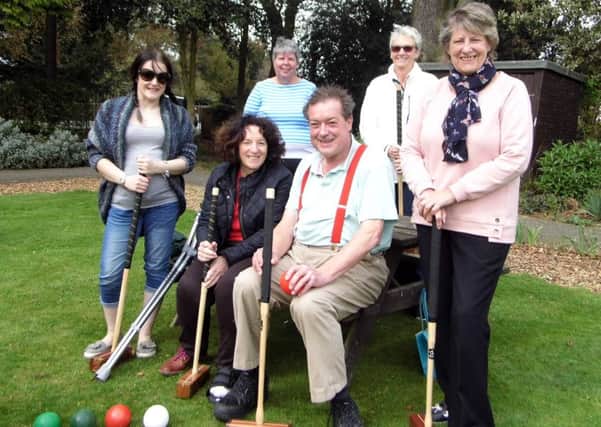 Sue, seated, with Melton Mowbray Croquet Club members at the start of the 2018 season EMN-180516-095808002