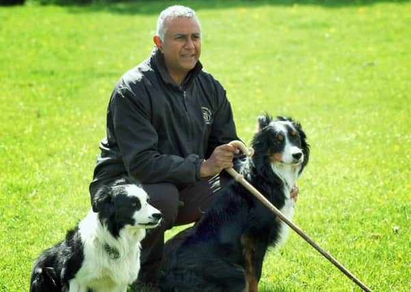 John O'Gaunt champion sheepdog trainer Nij Vyas with his sheepdogs Todd and Cody EMN-181105-133429001