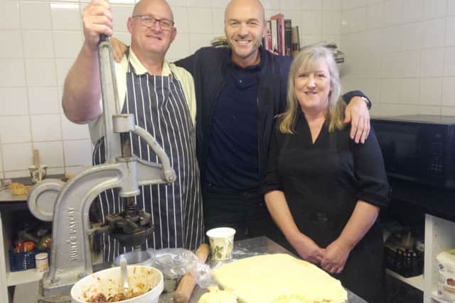 Television chef Simon Rimmer (centre) with Nice Pie co-owners Phil and Kath Walmsley EMN-181105-142115001