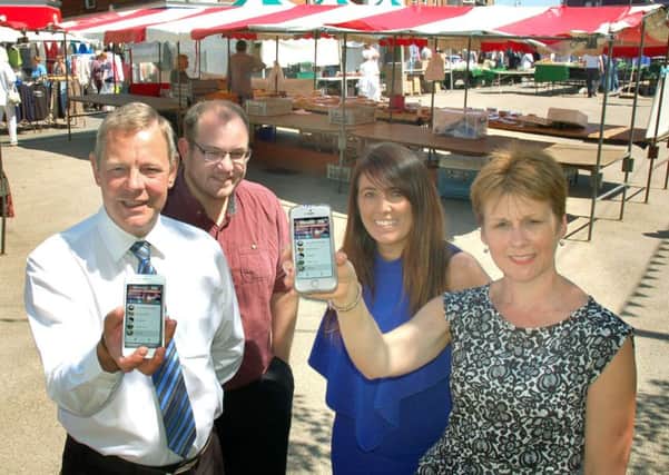 Andrew Cooper (Melton Town Estate), Michael Harris (Melton Theatre), Siobhan Lane (RS Bridal Collection) and Shelagh Core (Melton BID manager) celebrate the launch of the new Melton app EMN-180515-154035001