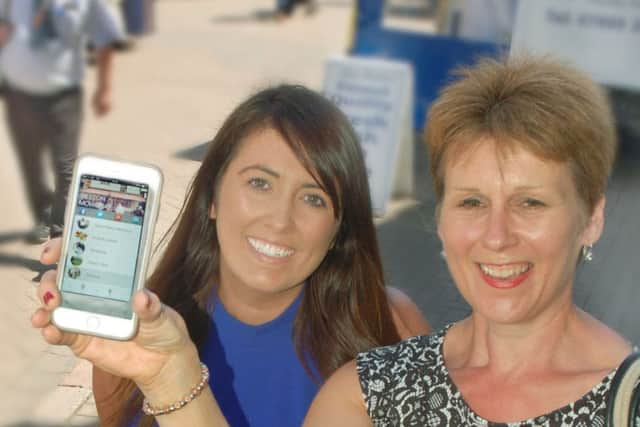 Siobhan Lane (RS Bridal Collection) and Shelagh Core (Melton BID manager) celebrate the launch of the new Melton app EMN-180515-154056001