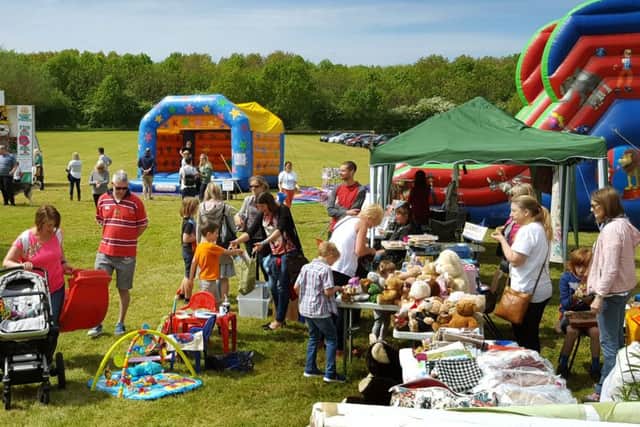 The fete in full swing, helped by the sunny weather PHOTO: Martin Fagan