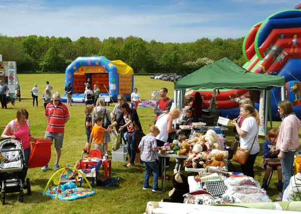 The fete in full swing, helped by the sunny weather PHOTO: Martin Fagan